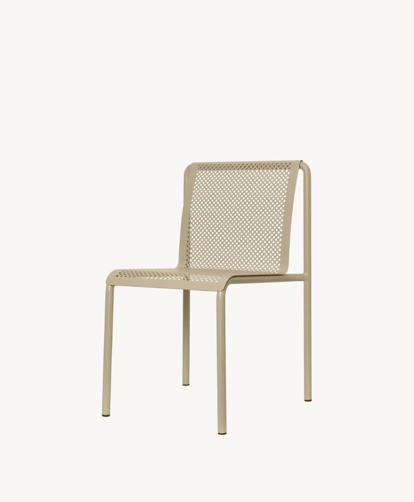 A beige metal chair with a perforated seat and backrest, featuring a minimalist design and four straight legs, set against a plain white background.
