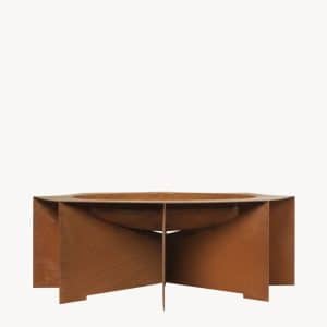 A rust-colored, geometric metal fire pit with a circular top and four intersecting rectangular panels forming the base, displayed against a plain white background.