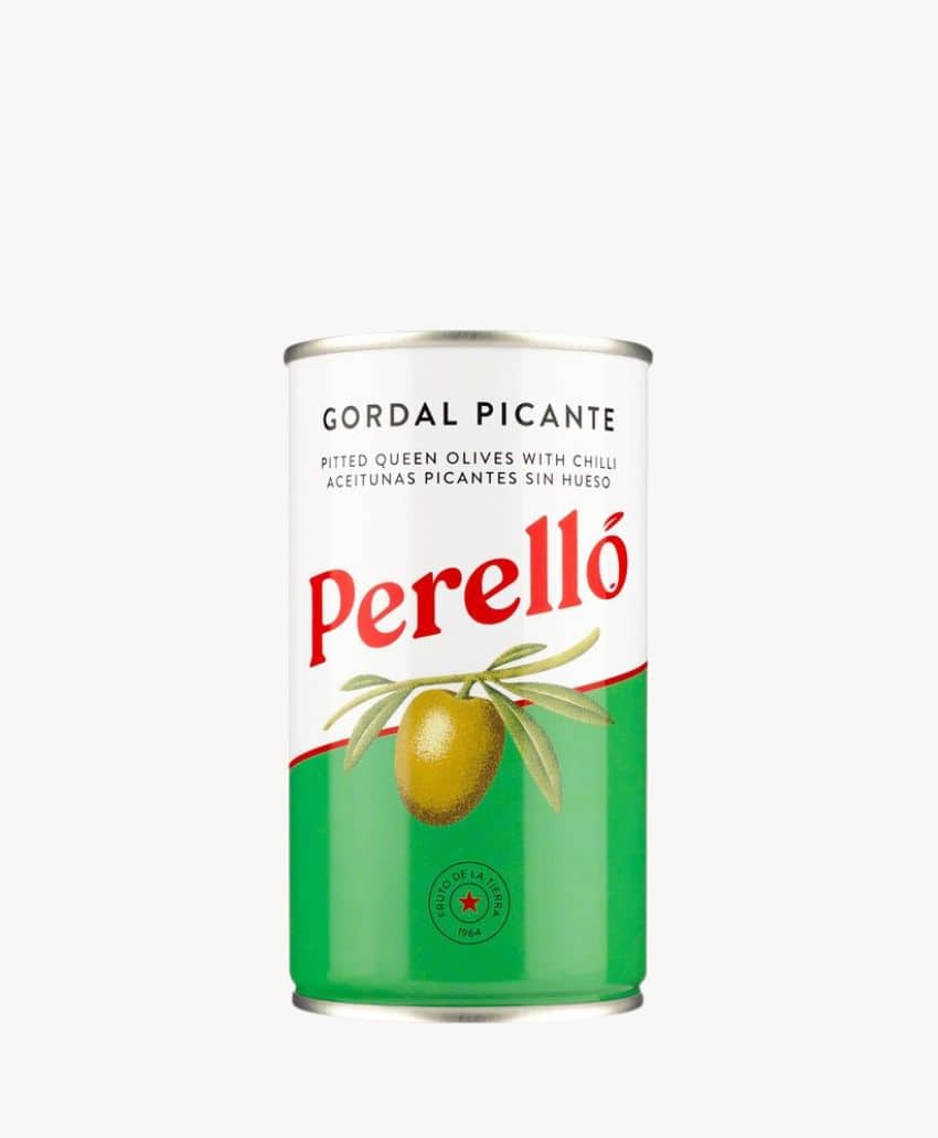 A can of Perelló Gordal Picante, featuring an illustration of green olives and leaves. The label includes English and Spanish text describing pitted queen olives with chili.