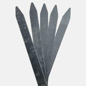 Five gray, pointed slate plant markers are fanned out against a plain white background.