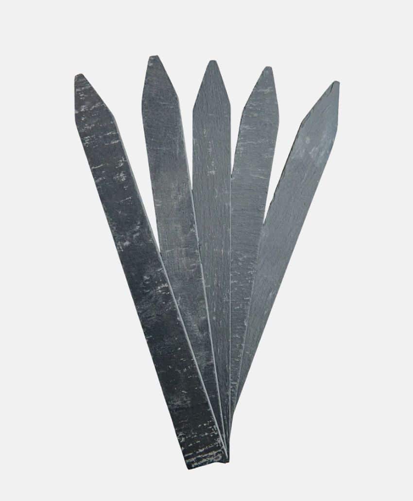 Five gray, pointed slate plant markers are fanned out against a plain white background.
