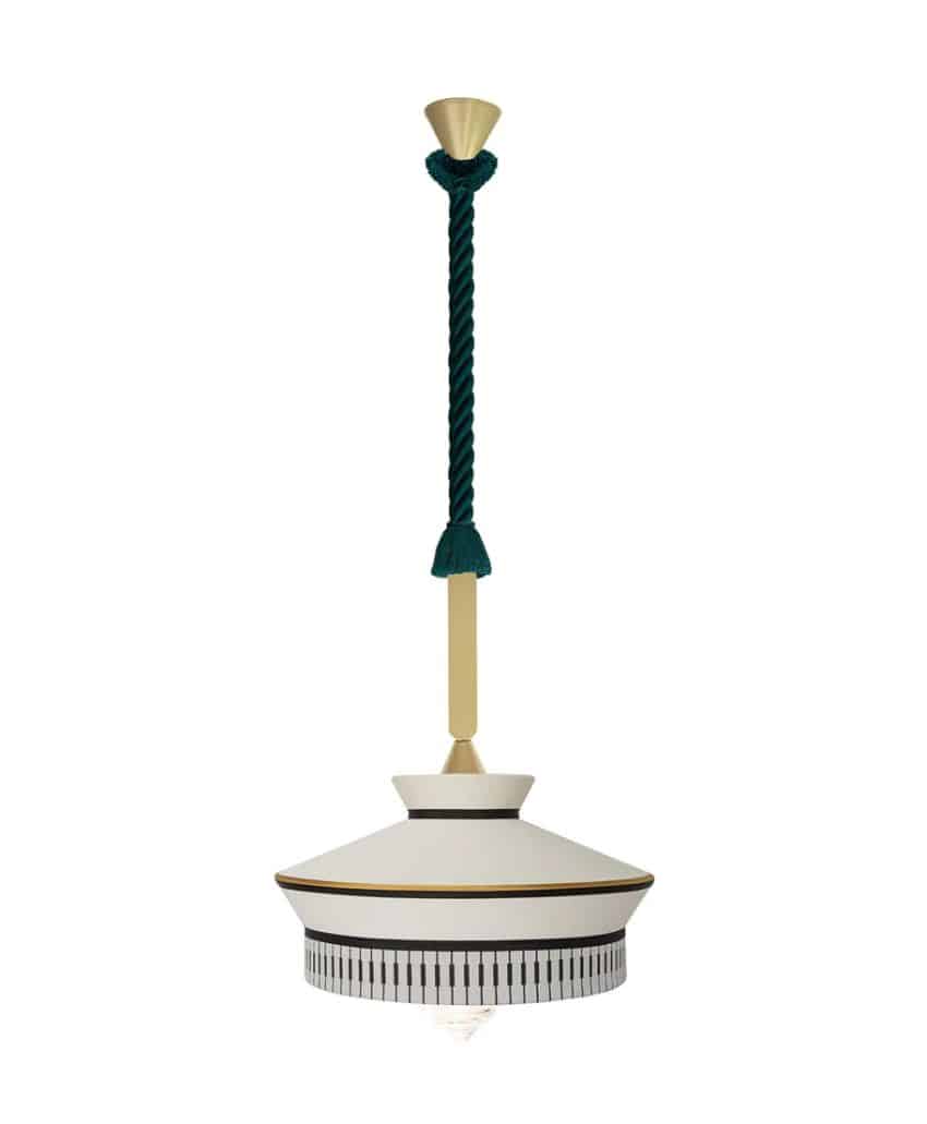 A modern pendant light with a white and gold shade, black vertical line accents, and a teal twisted rope attaching the brass fixture to the ceiling mount.