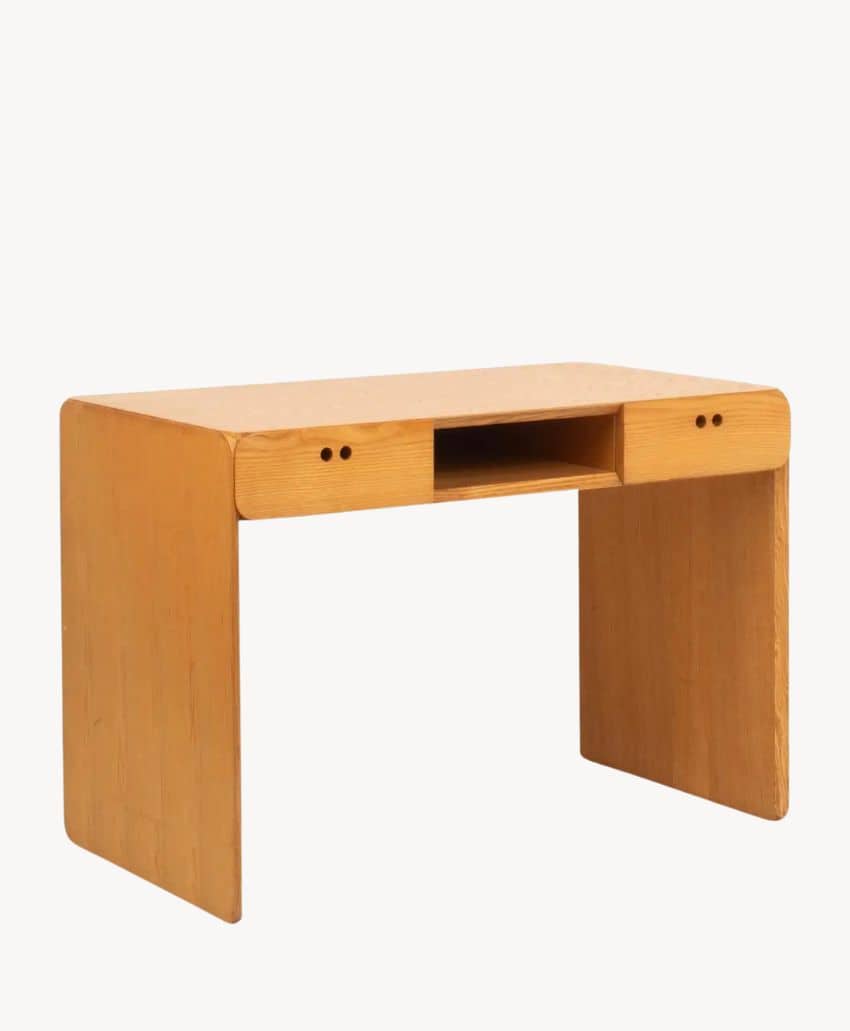 A simple wooden desk with rounded edges, a flat top, and a single open shelf beneath the tabletop, set against a plain white background.