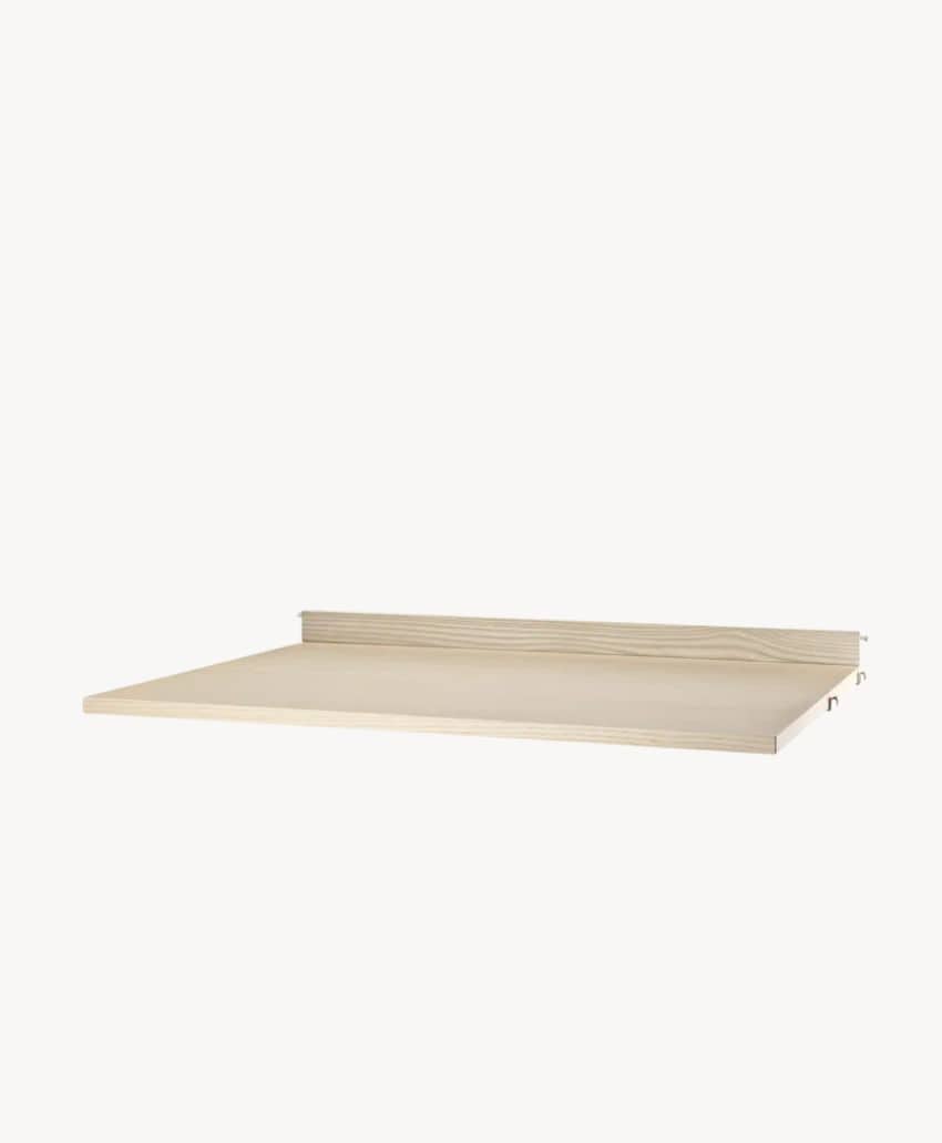 A light wood shelf with a small back lip, mounted against a plain white background.