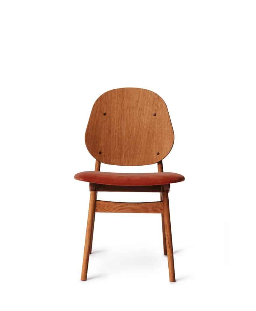 A wooden chair with a rounded backrest and seat, featuring four legs and a reddish-brown cushioned seat, set against a plain white background.
