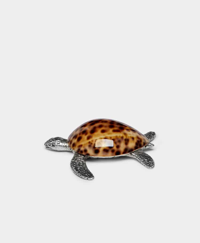 A decorative turtle figurine with a brown, spotted shell and silver metallic head, legs, and tail, set against a plain white background.