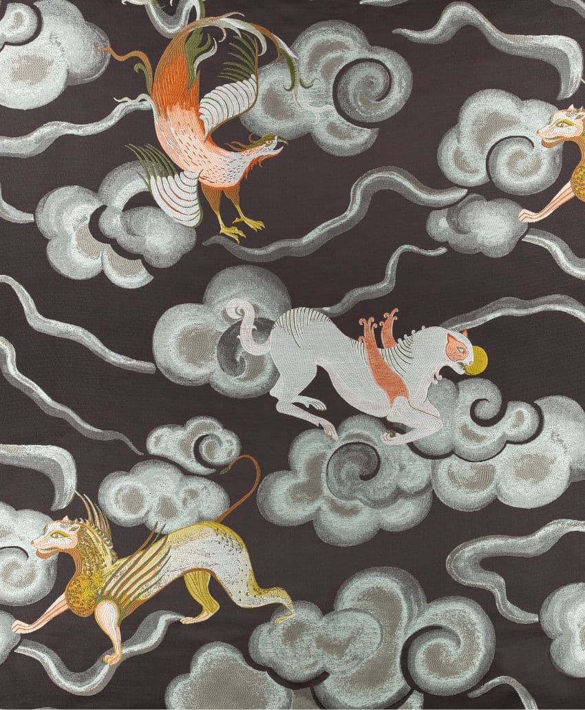 A patterned design featuring mythical creatures, including a bird and lion-like beasts, among swirling clouds on a dark background. The creatures are illustrated in shades of gold, white, and orange.