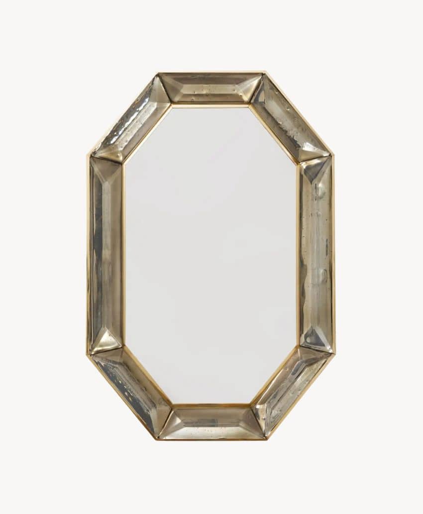 An octagonal wall mirror with a beveled edge and a gold metallic frame, shown against a plain white background.