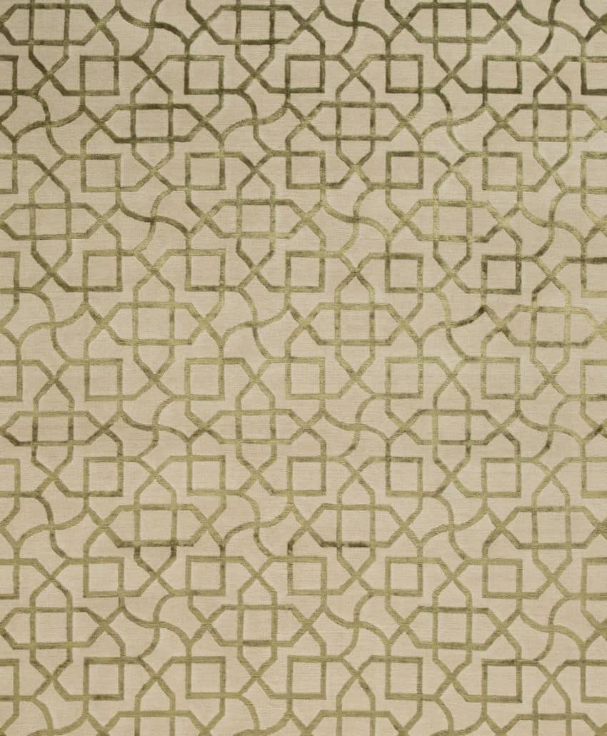 A beige surface with an intricate geometric pattern in olive green, featuring interlocking lines forming squares and curved shapes in a repeating design.