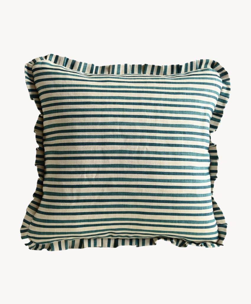Square pillow with dark green and white horizontal stripes and a ruffled edge, set against a plain white background.