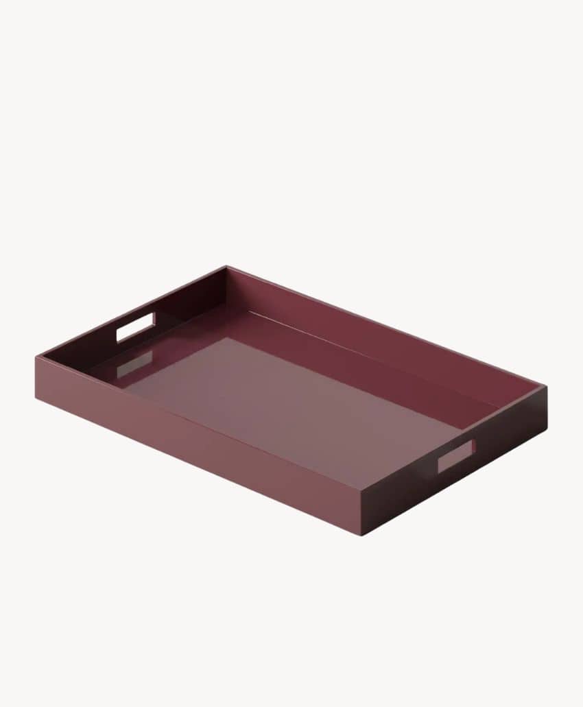 A rectangular, dark red serving tray with short sides and cutout handles on each end, shown against a plain white background.