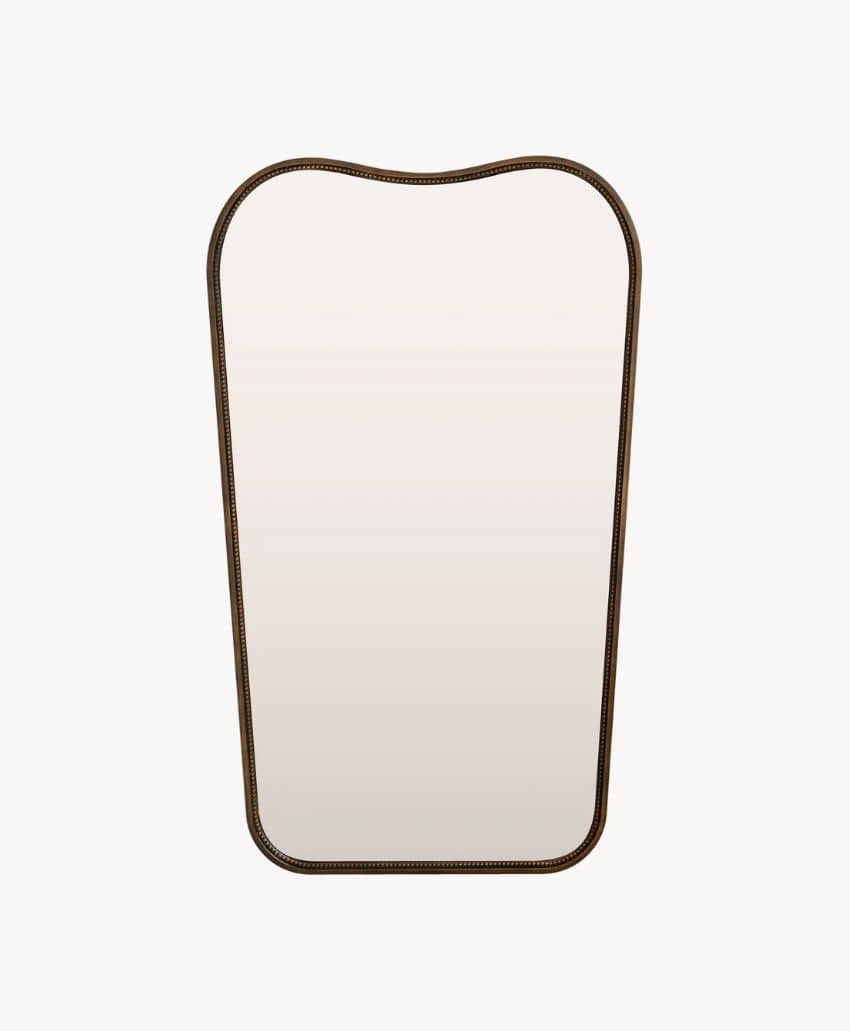 A decorative wall mirror with a bronze or dark metal frame, featuring a curved top and rounded edges, set against a plain white background.