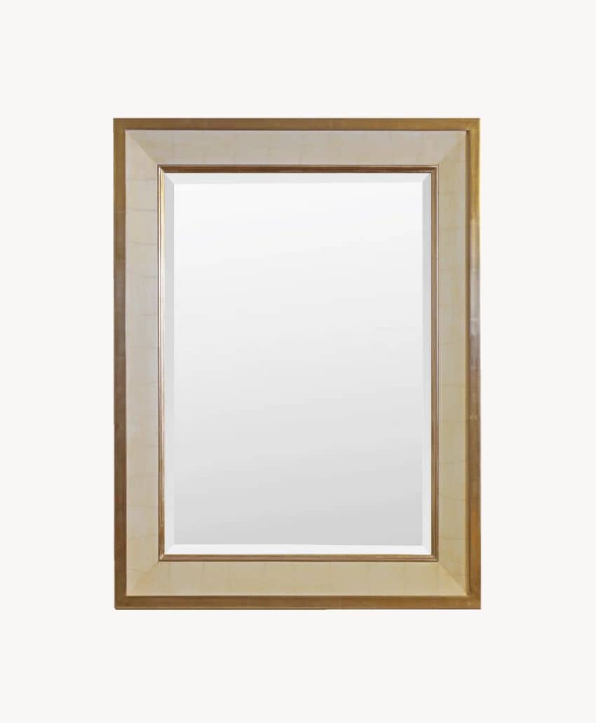 A rectangular wall mirror with a wide, light beige and gold frame, set against a plain white background.