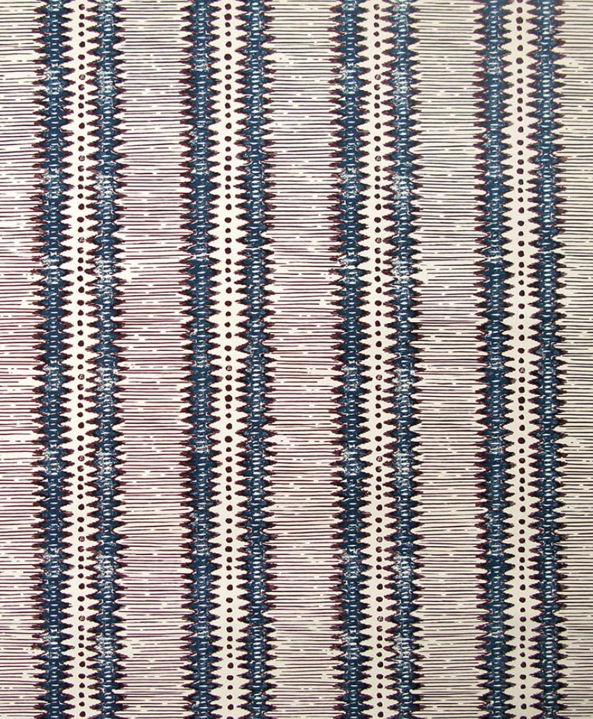 Patterned fabric with vertical zigzag stripes in blue, maroon, and beige tones. The stripes are closely spaced, creating a repetitive, geometric, and symmetrical design across the fabric.