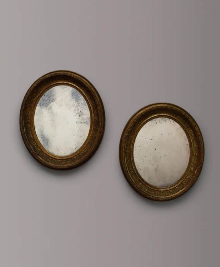 Pair of Gilt Oval Mirrors