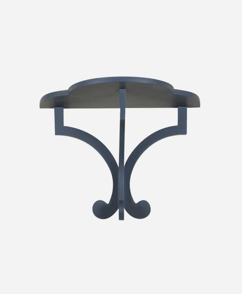 A small, dark blue wooden wall shelf with a curved semi-circular top and two decorative curved supports underneath, mounted against a plain white background.