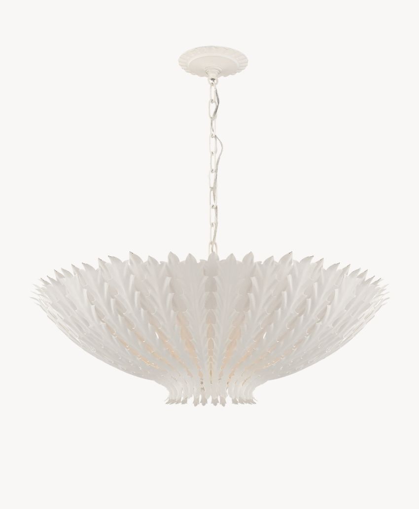 A white hanging chandelier with a wide, bowl-shaped shade featuring layered, leaf-like patterns and a chain connecting it to the ceiling.