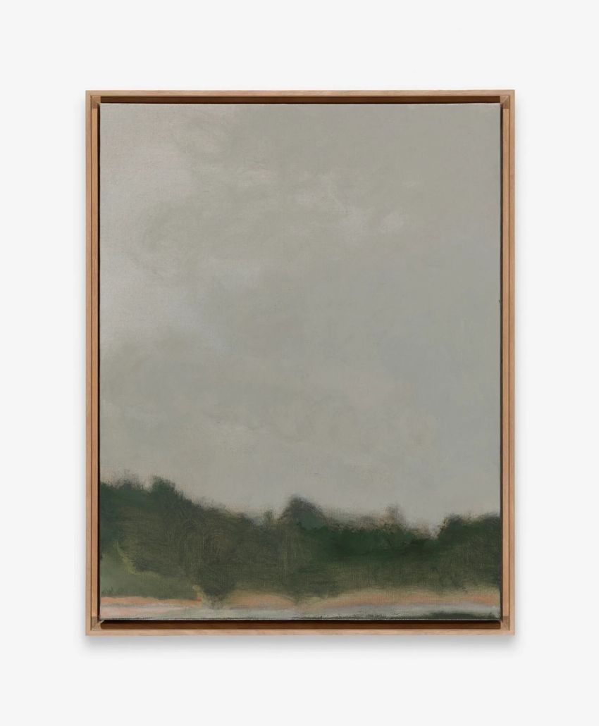 A framed painting with a blurry, dark green and black treeline at the bottom and a large expanse of muted, grayish sky above, creating a calm, minimalist landscape scene.