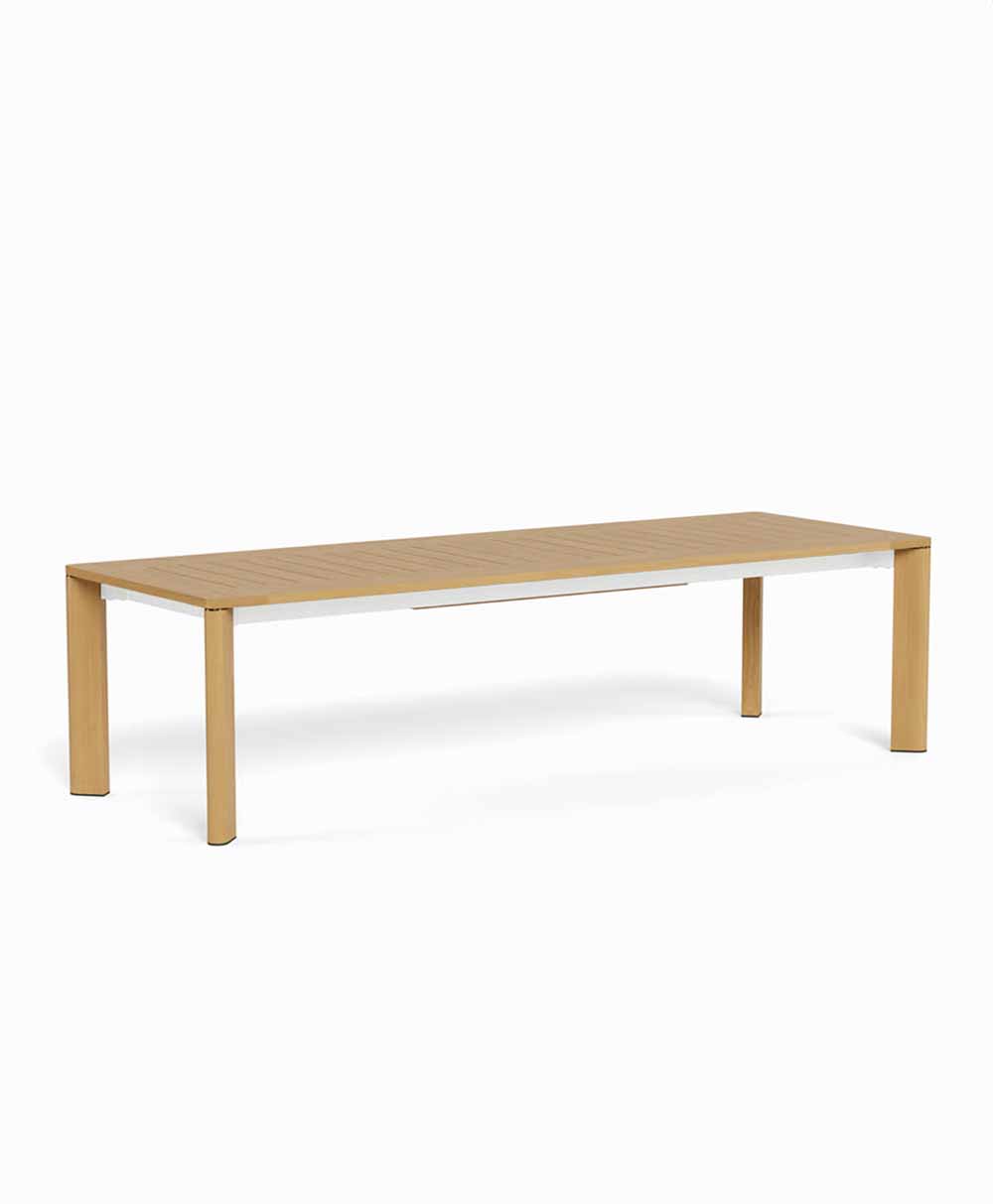 Rectangular wooden table with a slatted top and four sturdy legs, set against a plain white background.