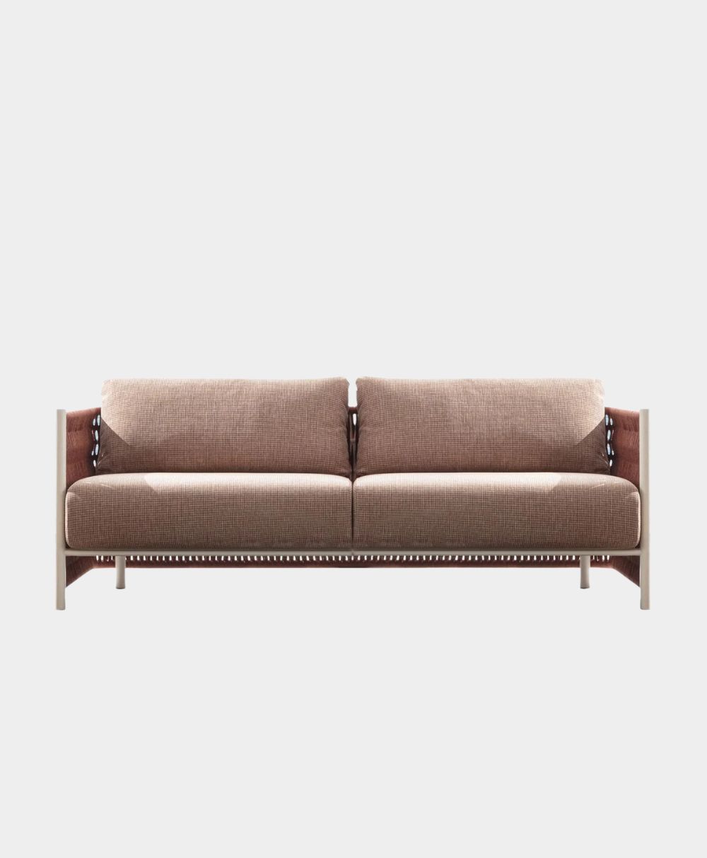 A modern, minimalist sofa with light brown cushions and a wooden frame, shown against a plain white background. The sofa has a clean, rectangular design with armrests and visible woven details on the sides.