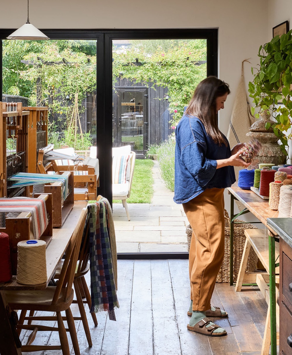 Katherine Fraser weaving at her handloom in her Bath studio