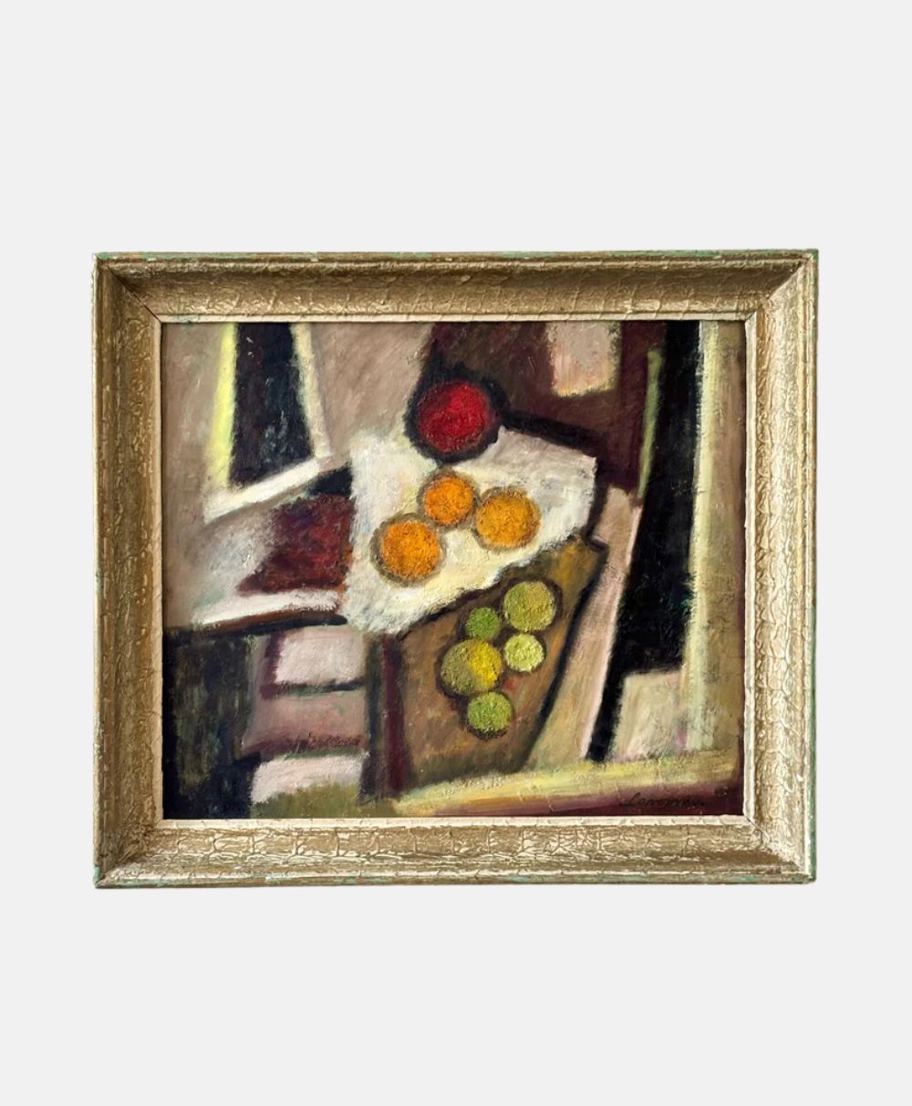 Framed abstract painting of fruit on a table, featuring red, orange, and green round shapes, rendered with bold brushstrokes and geometric forms in muted tones.