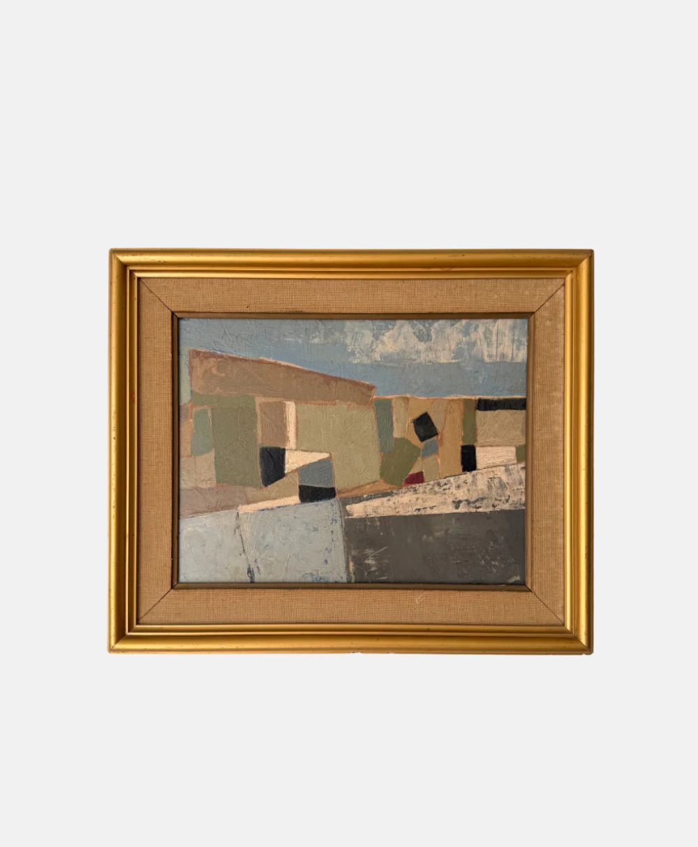 Framed abstract painting featuring geometric shapes in muted earth tones, including beige, tan, gray, and green, set against a light blue background. The frame is gold with a fabric mat.