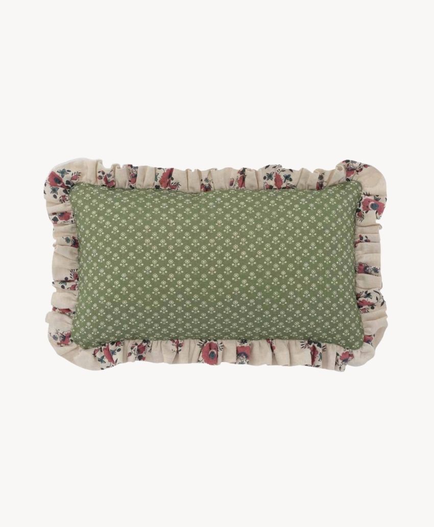 Inchyra Daisy Linen rectangular cushion in Fern, a small green daisy print with a contrasting red floral frilled edge