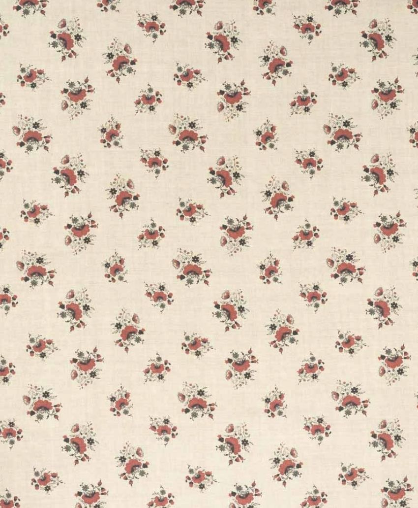 Inchyra Labeaume Posy Linen fabric in Cherrywood, small red and green floral posies scattered on a natural linen ground