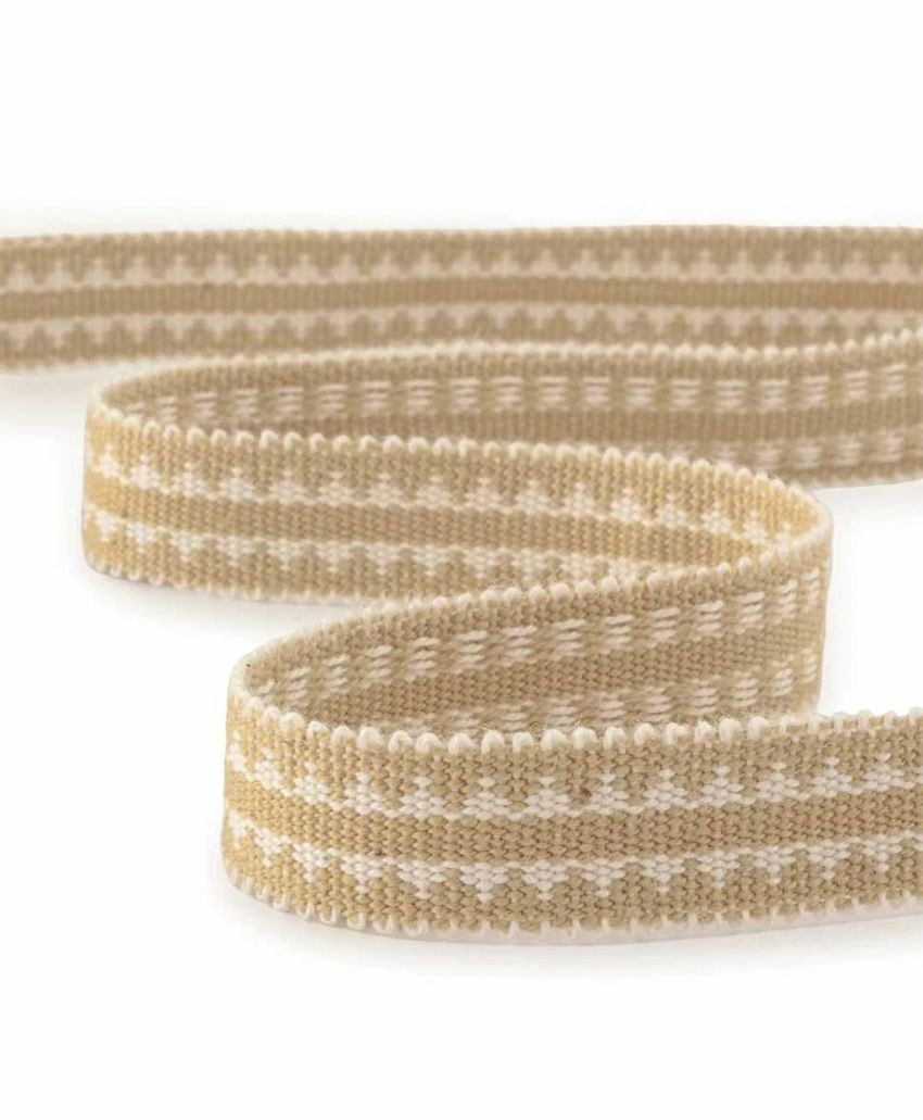 Inchyra Labeaume Gimp trim in Mustard, a narrow woven braid in mustard and cream, shown coiled