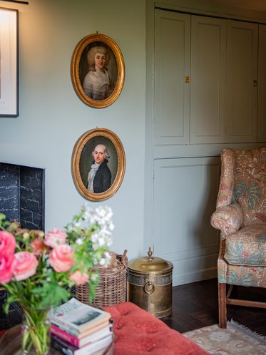 Two framed 18th-century portraits displayed on a wall in the Sulis Fine Art collection