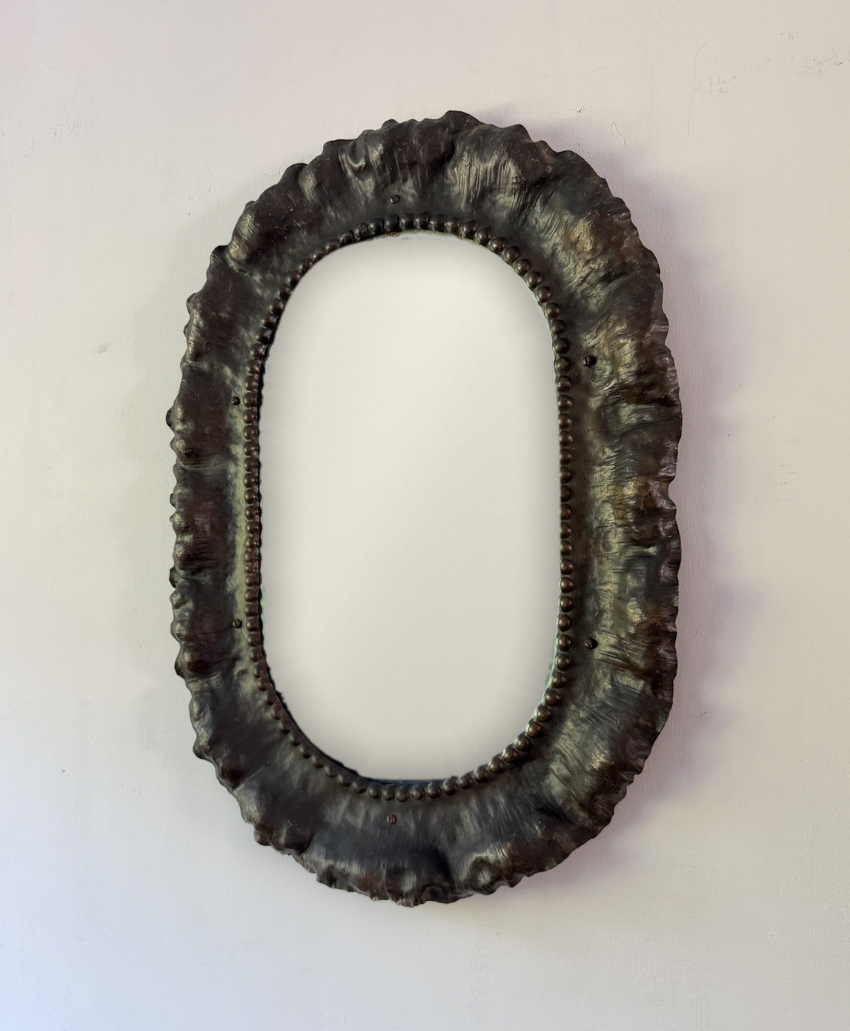 Fern & Green Antique Art Nouveau Bevelled Wall Mirror in Metallics, UK, Scheme Interior, a decorative bevelled mirror surrounded by a wavy metal frame.