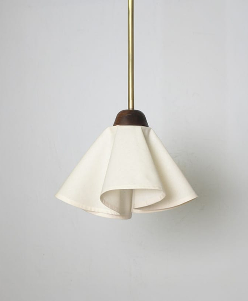 Fosbery Studio Cascade Pendant in White and Brass, UK, Scheme Interior, a pendant light combining a white shade with brass details.