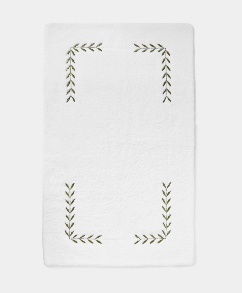 Heirlooms Laurel Leaf Embroidered Egyptian Cotton Bath Mat in White and Green, UK, Scheme Interior, a cotton bath mat decorated with embroidered laurel leaf motifs.