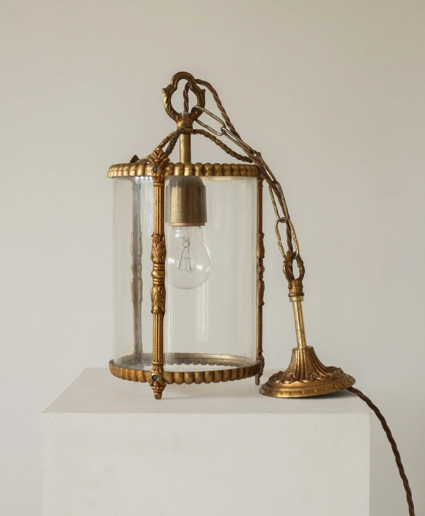 Maud Vaughan Early 20th Century French Brass Lantern, UK, Scheme Interior, a vintage lantern-style light with a decorative brass frame.