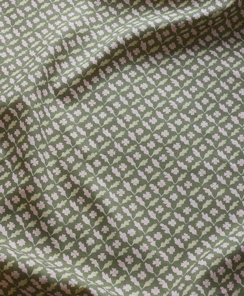 Sophie Harpley Oxalis Oak Linen in Olive, UK, Scheme Interior, a green and cream linen fabric.