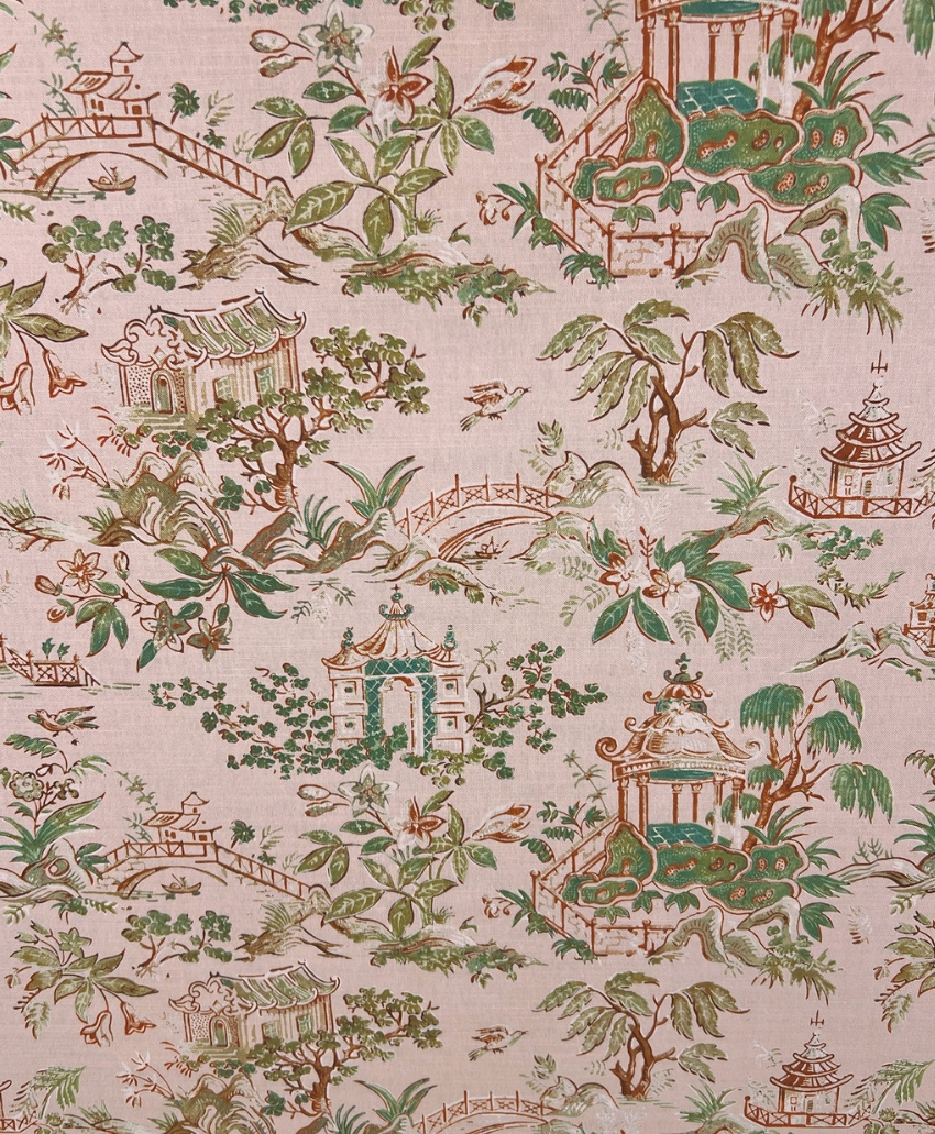 Intricate garden-inspired fabric featuring flowering trees, botanical motifs and delicate architectural details in soft pink and green by Teyssier. Scheme, UK