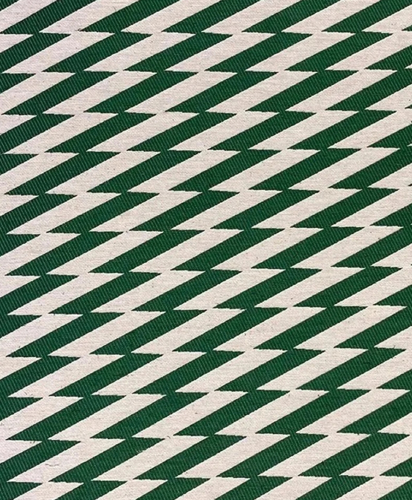 Striking green and white zigzag woven fabric from the Virginia White Collection. Scheme, UK