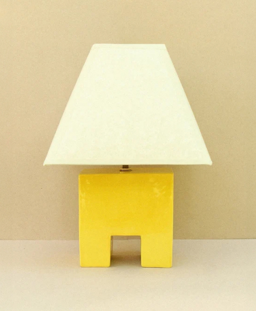 Wondering People Cristo Lamp (Sol) in Yellow, UK, Scheme Interior, a decorative table lamp with a sculptural base and a light-coloured shade.